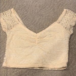off-the-shoulder light pink/tan lacy crop top